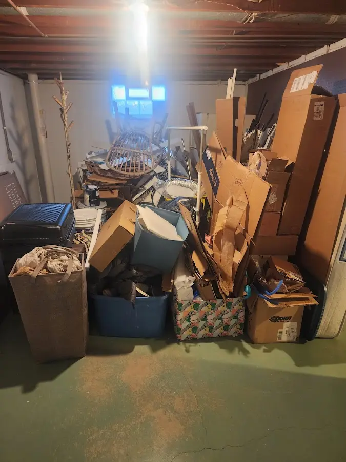 Roll-off dumpster container at job site for 15 Yard Dumpster Rental in Clanton